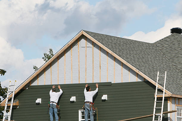 Professional Siding Contractor technician working in Everett, MA